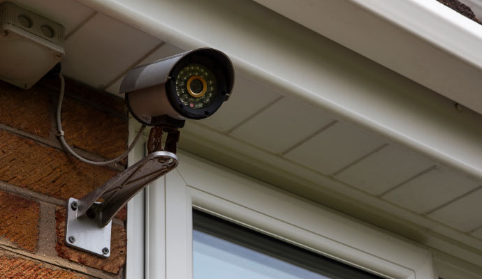 CCTV camera on brick wall