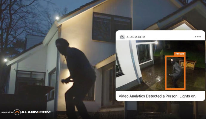 burglary detection system identifying a person outside the house