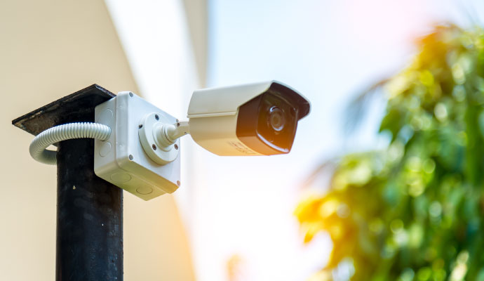 security camera mounted on a black bracket