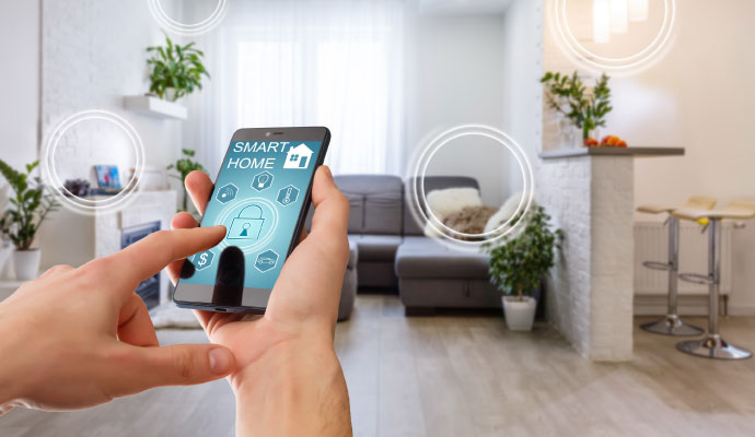 Hands holding smartphone with smart home app